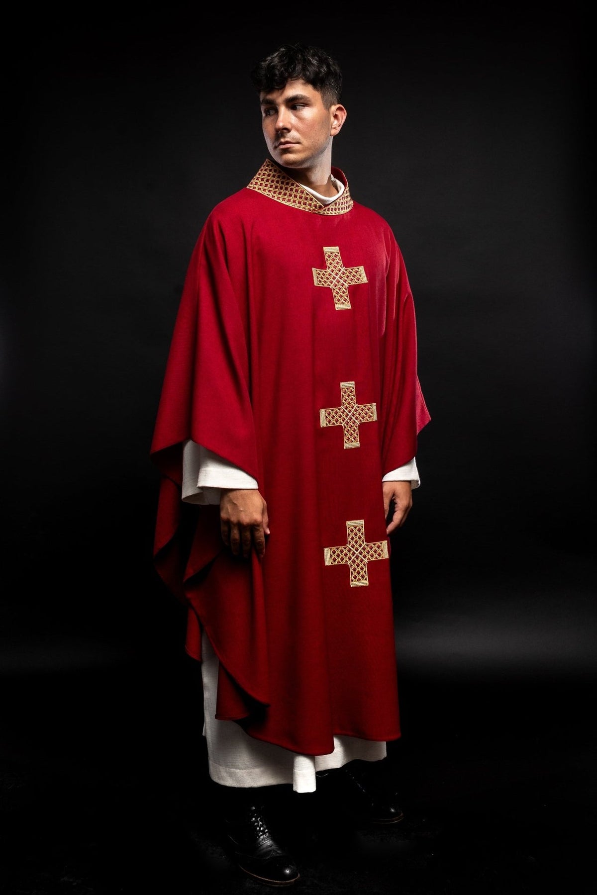 Red chasuble, full front view with three gold embroidered crosses and collar