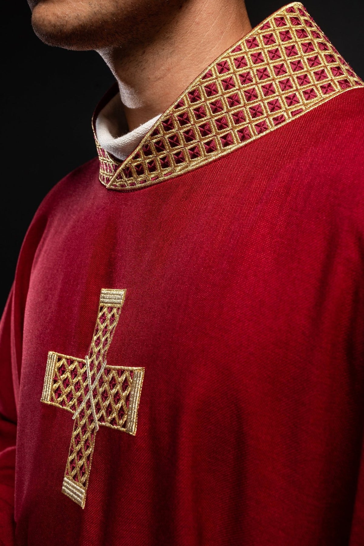 Red chasuble, side close-up of gold cross embroidery and collar