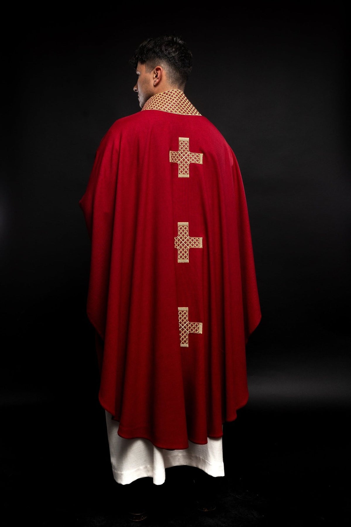 Red chasuble, full back view with three gold embroidered crosses