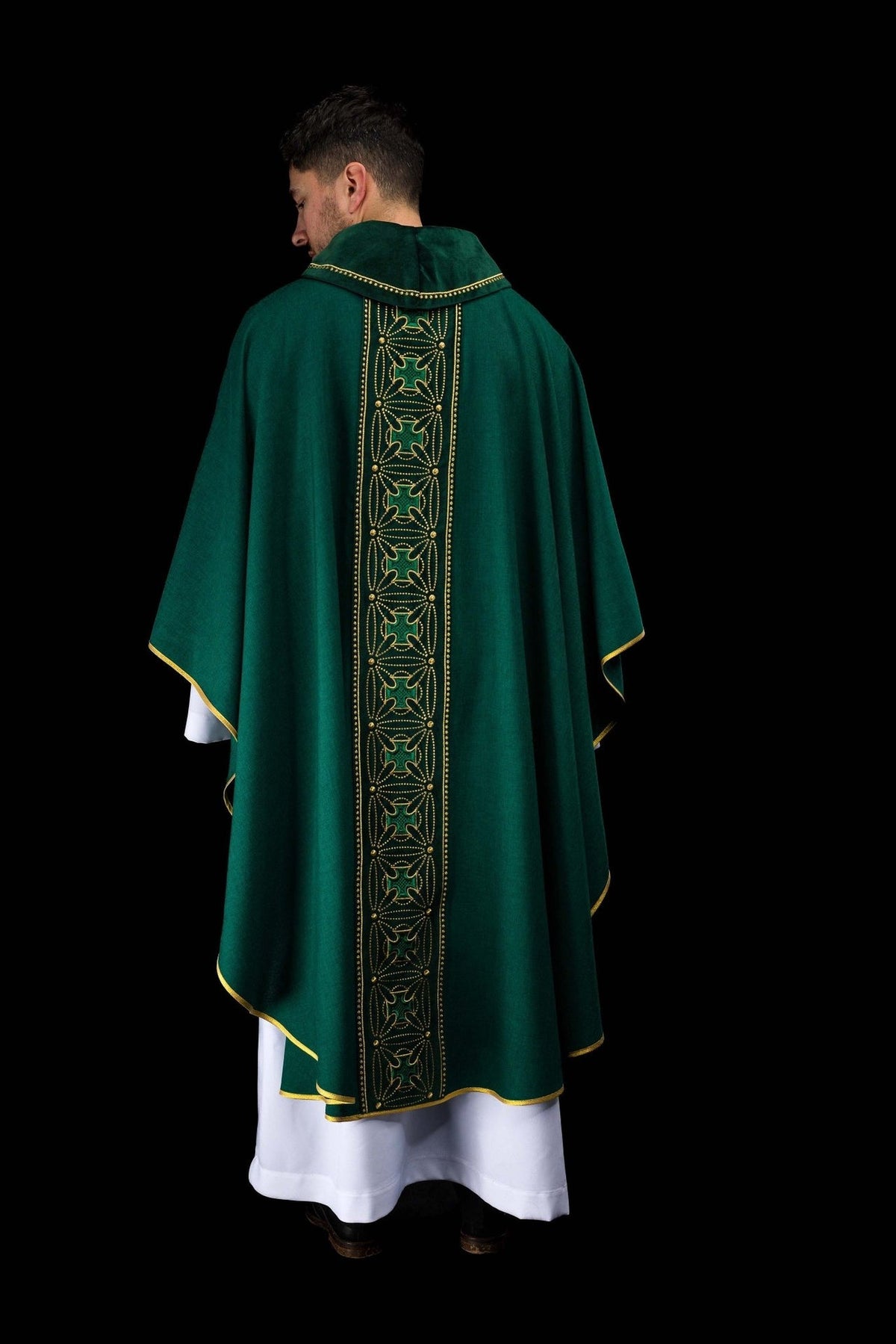 Green chasuble back view showing full embroidered orphrey
