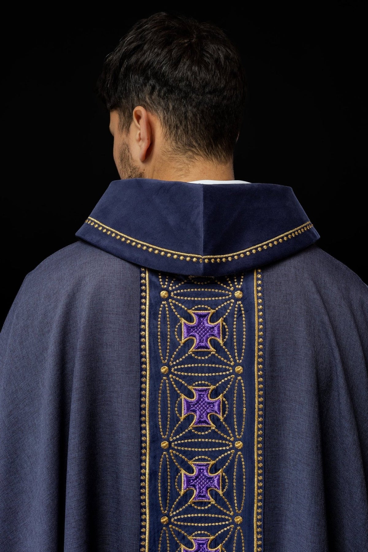 Purple chasuble back view with embroidered cross orphrey