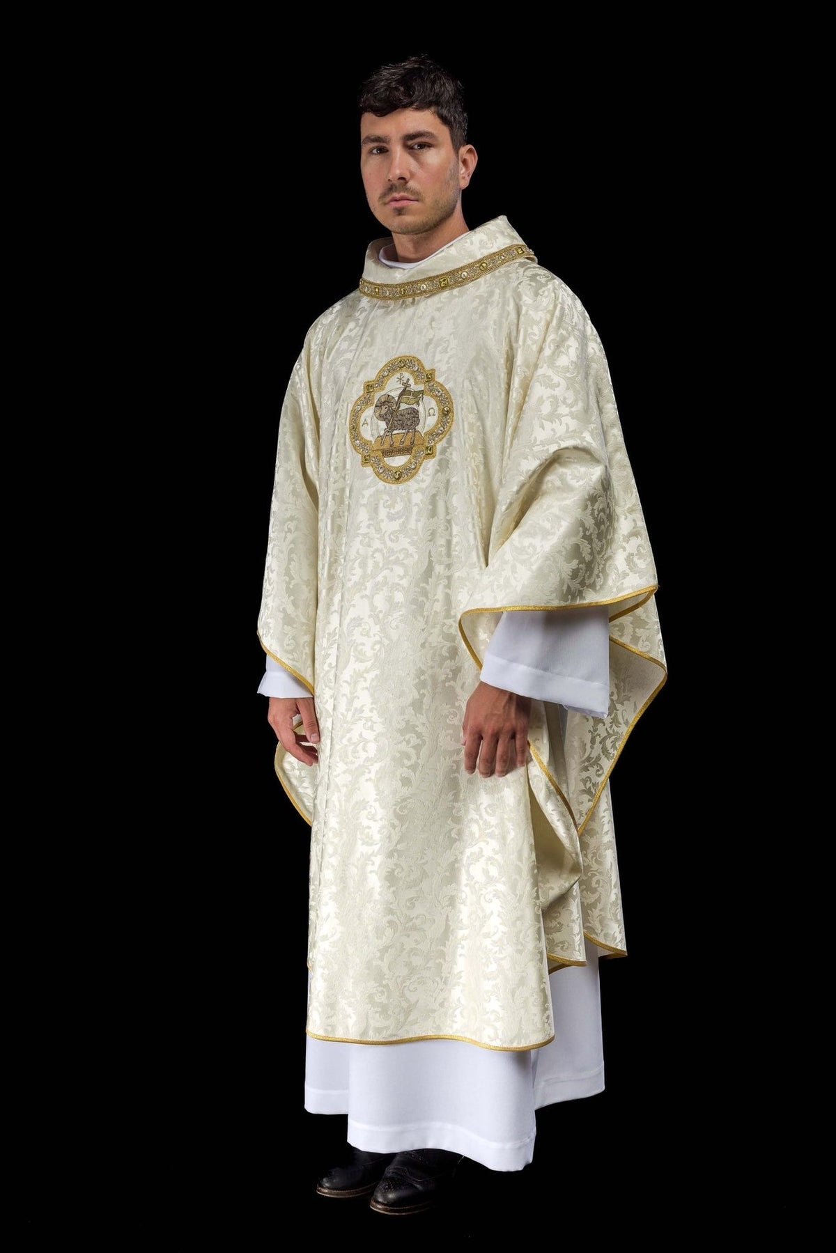 Ecru chasuble side view with flowing jacquard fabric and gold trim