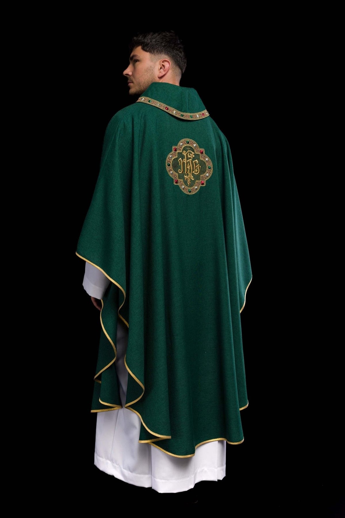 Green chasuble rear three-quarter view with IHS embroidery and gold edge trim