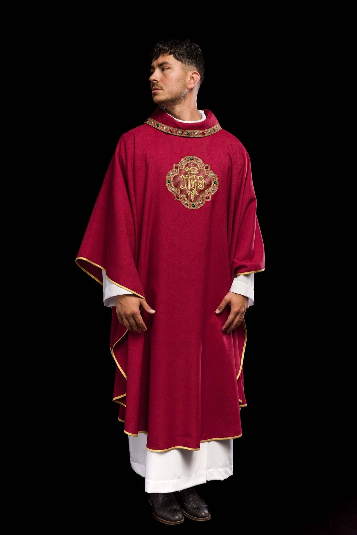 Red chasuble, front three-quarter view with collar, sleeve trim and IHS embroidery