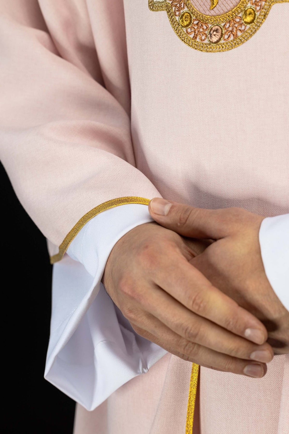 Rose chasuble sleeve with gold trim and white lining