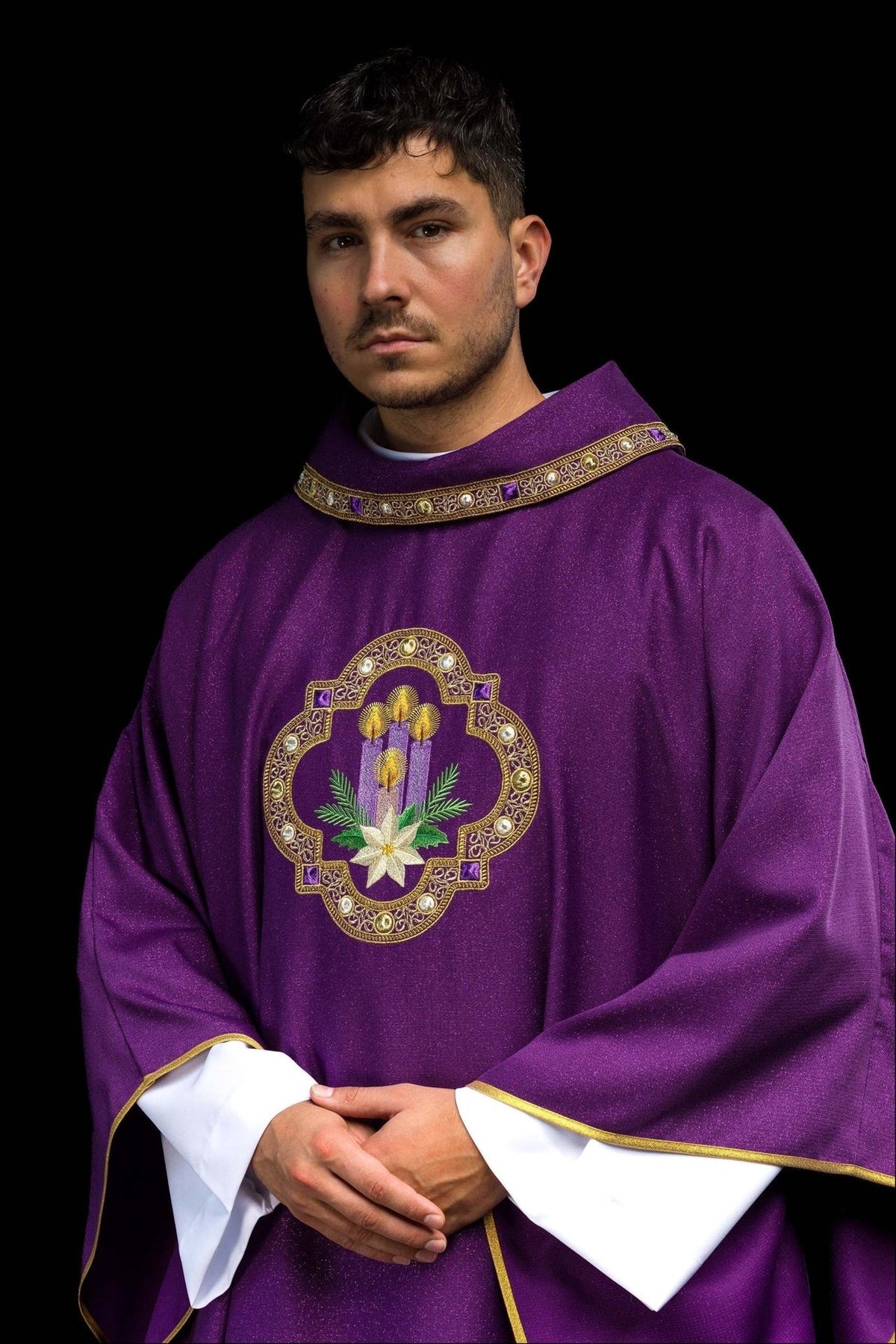 Purple Advent chasuble worn from the front with gold trim and candle embroidery