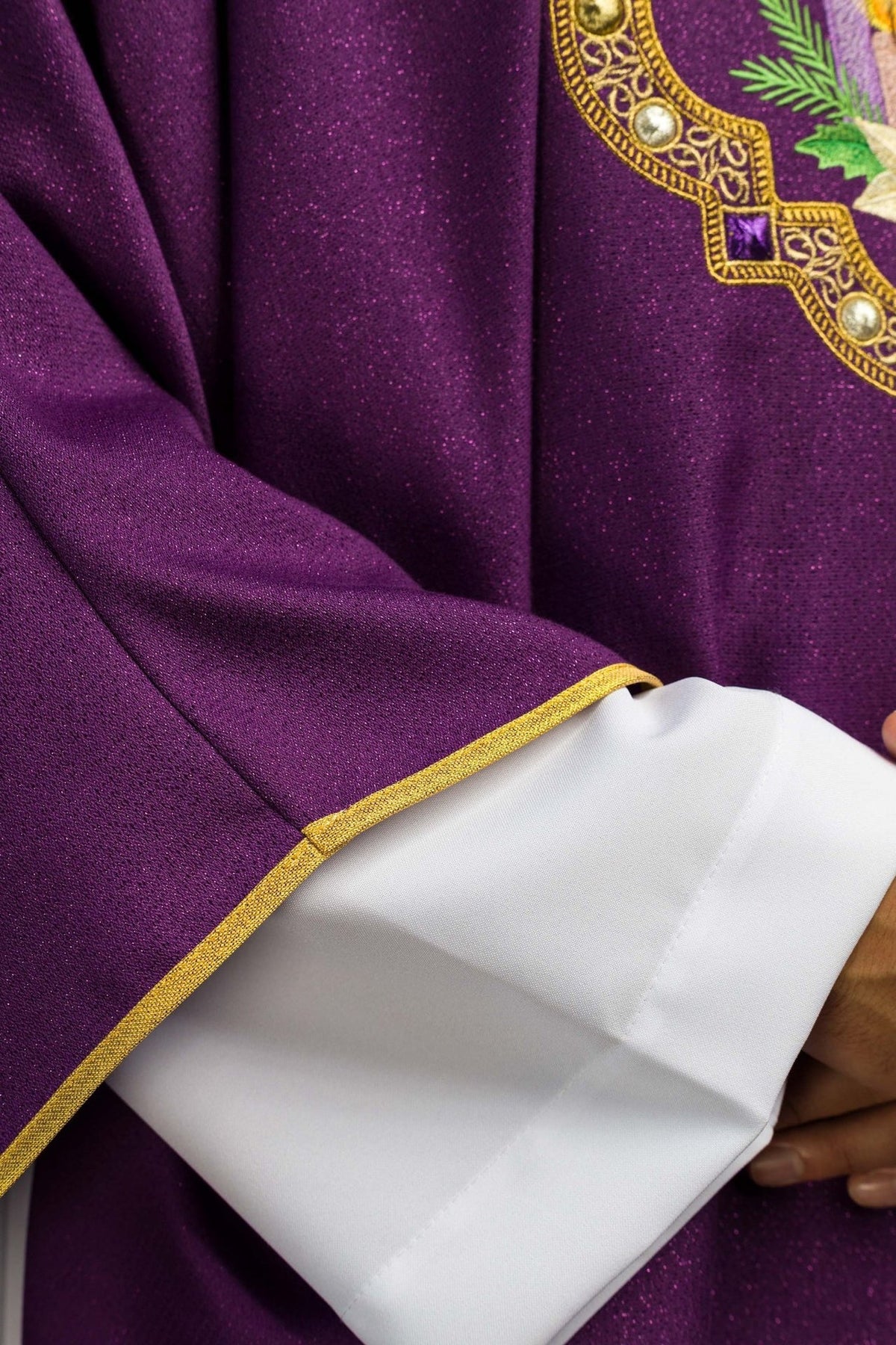 Purple Advent chasuble front detail with gold trim on the sleeves