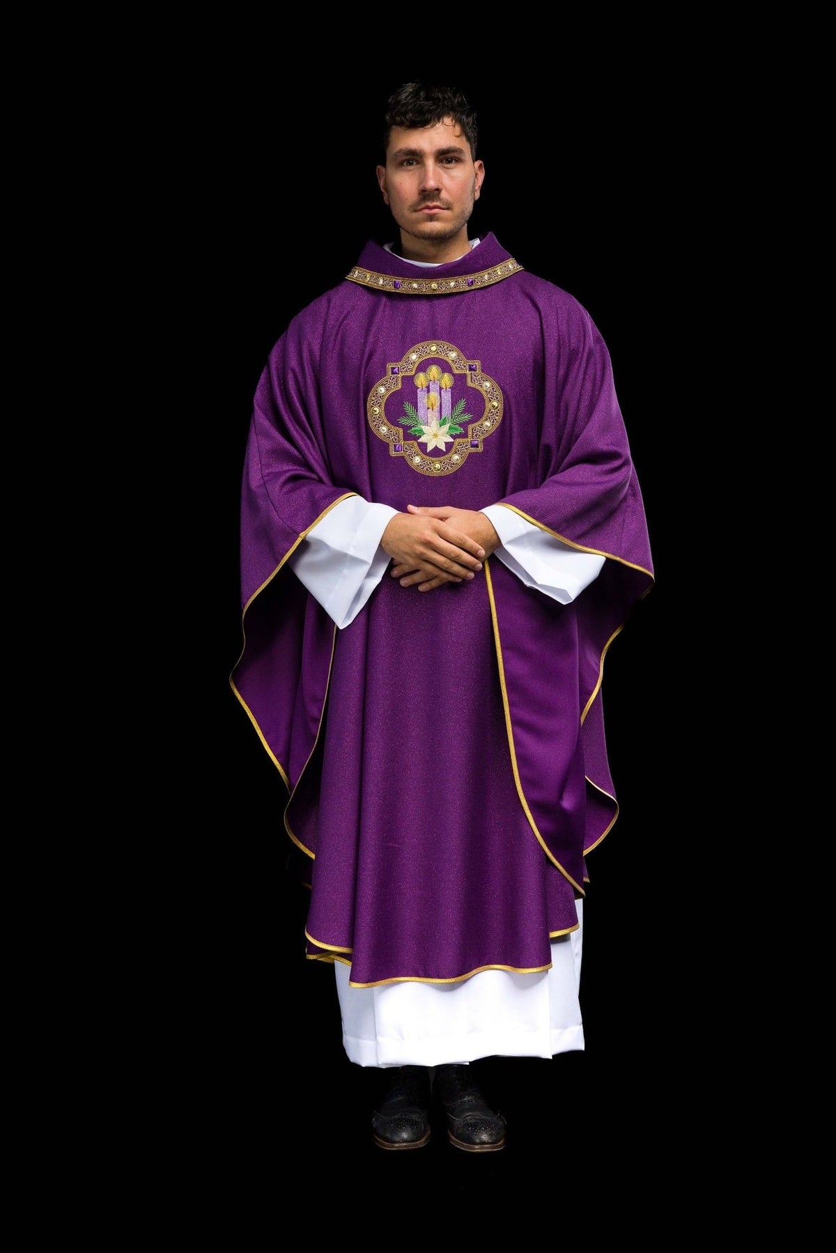 Purple chasuble close-up showing shimmering fabric and gold sleeve trim