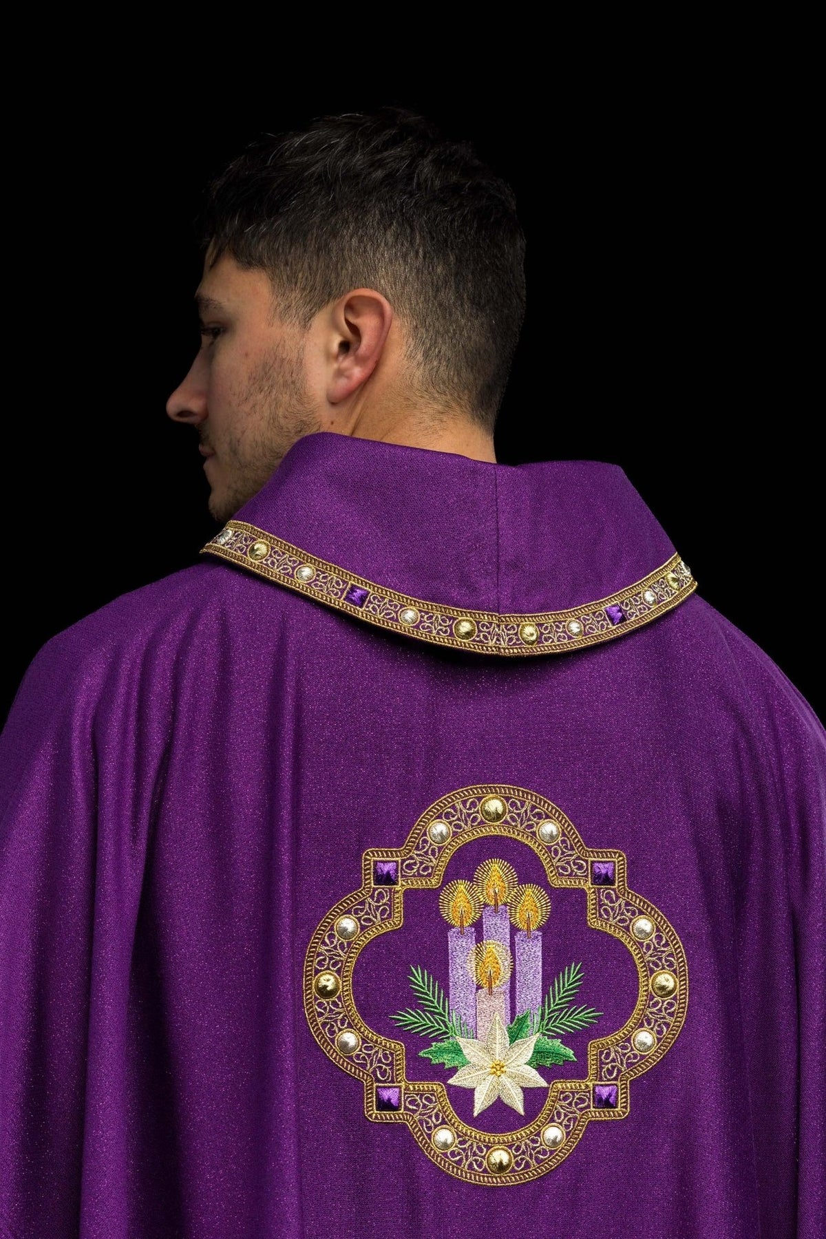 Purple chasuble side close-up showing shimmering fabric and gold collar trim
