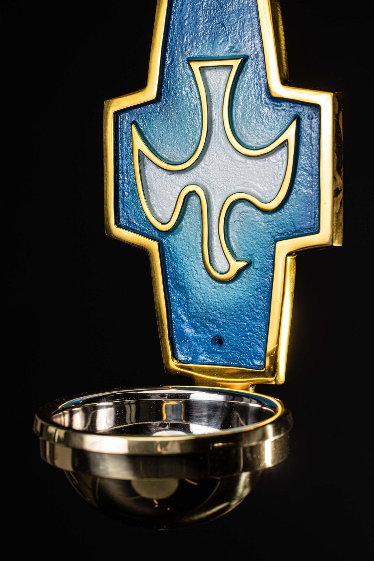Holy water font front view showing the gold-trimmed blue panel and basin