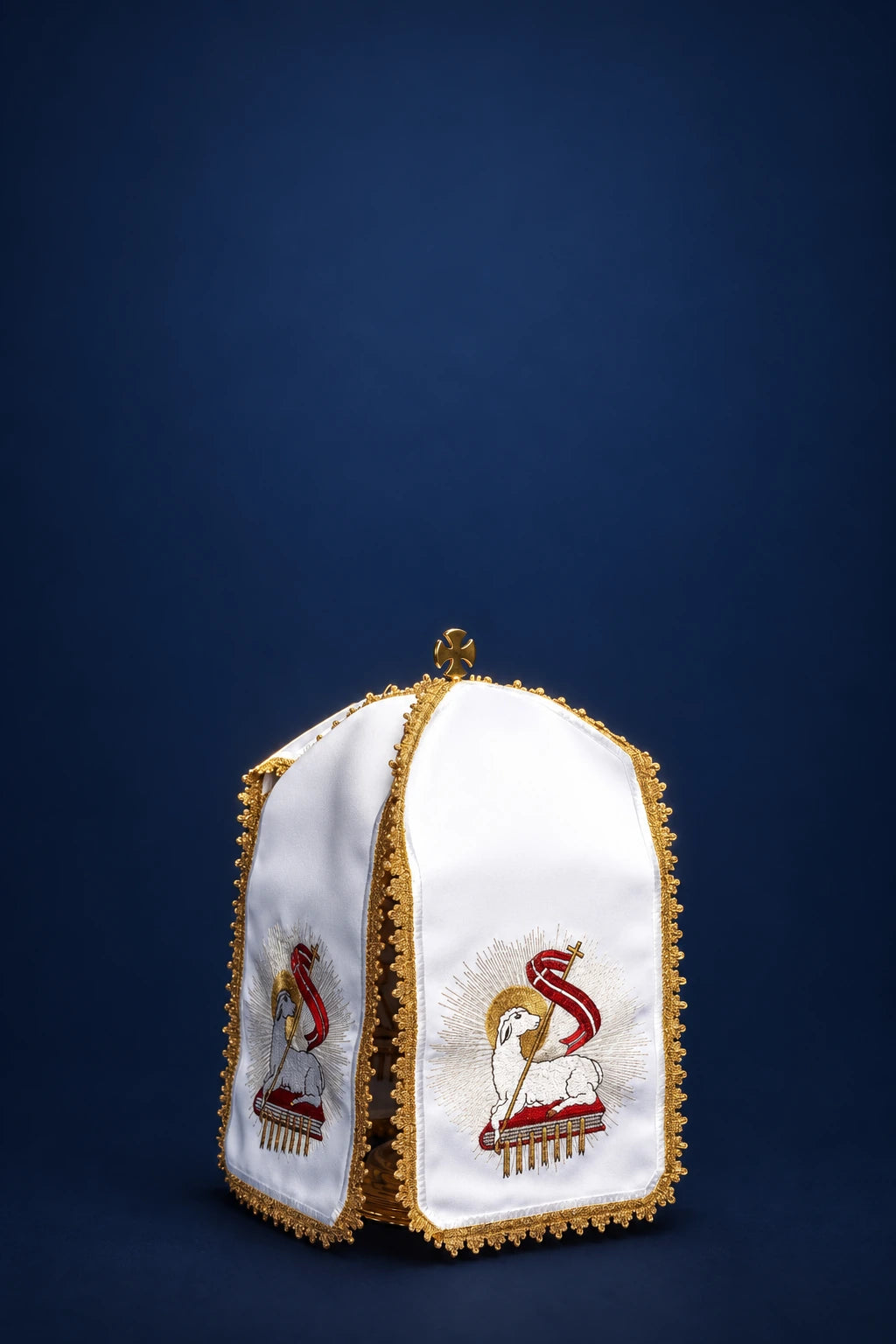 White ciborium veil with gold trim and Paschal Lamb embroidery, three-quarter view