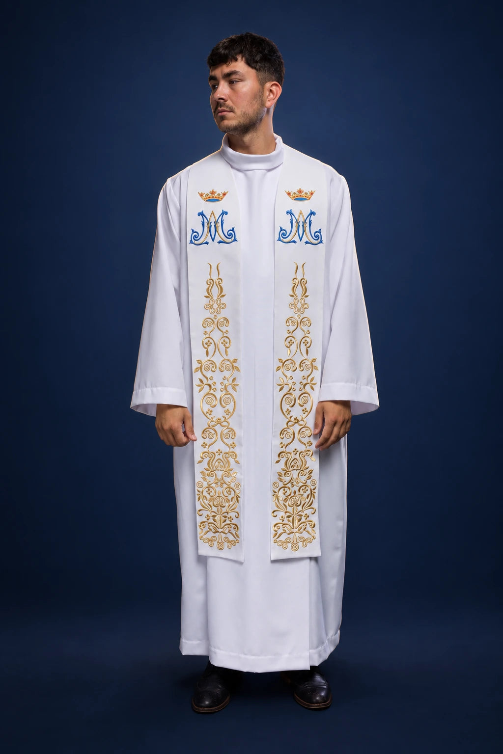White priest stole with Marian “M” and crown embroidery, front view, worn over a white alb